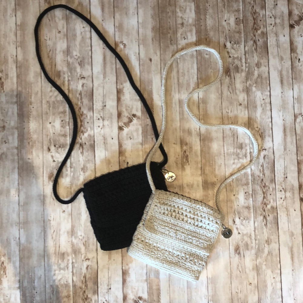Two “The Sak” crossbody macrame purses. Blk & crm.